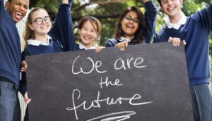 School children holding abanner