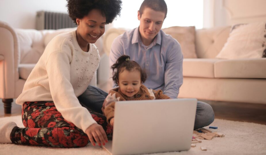 Parent and child saving money together, representing the benefits of a Custodial Roth IRA for kids